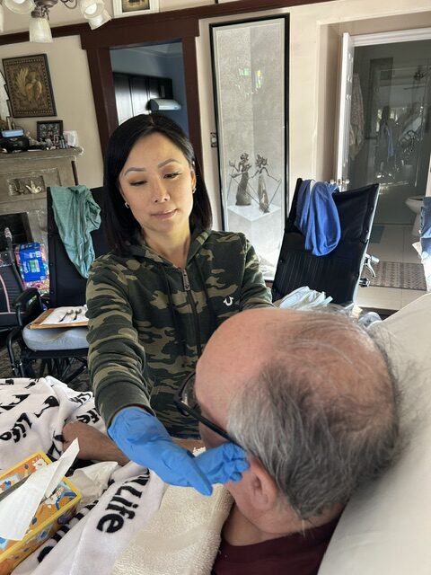 Hands-on home health care during a home visit
